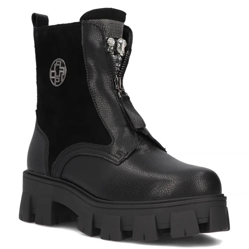 Trendy na zimę 2025: Jakie buty będą modne w tym sezonie?